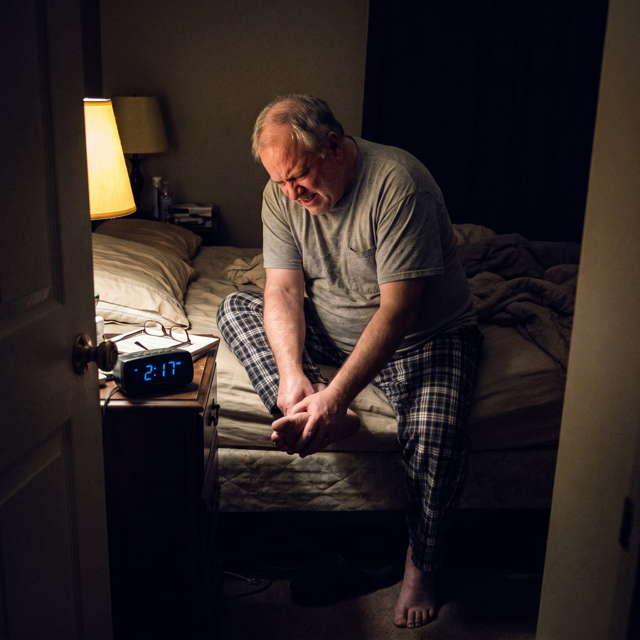Man awake at 2am with burning feet