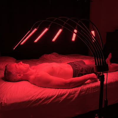 Customer lying in bed under the Red Light Lantern